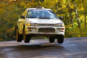 Henry Krolikowski / Cindy Krolikowski catch nice air in their Subaru Impreza on the midpoint jump on Brockway Mtn. 1, SS13.