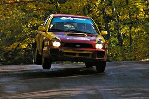 Bryan Pepp / Jerry Stang catch air at the midpoint jump on Brockway Mtn. 1, SS13, in their Subaru WRX.
