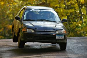 Silas Himes / Matt Himes lands soft at the midpoint jump on Brockway Mtn. 1, SS13, in their Honda Civic.