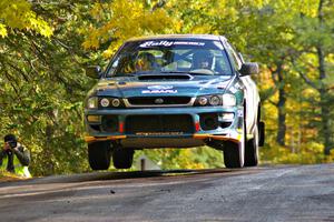 Jaroslaw Sozanski / Bartosz Sawicki catch air at the midpoint jump of Brockway Mtn. 1, SS13, in their Subaru Impreza RS.