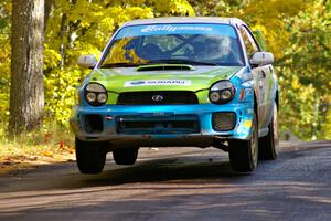 Pete Hascher / Scott Rhoades take it easy at the midpoint jump on SS13, Brockway 1, in their Subaru WRX.