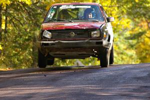 Matt Bushore / Andy Bushore catch a little air at the midpoint jump on Brockway Mtn. 1, SS13, in their VW Jetta.