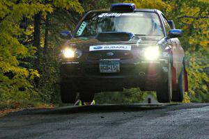 Carl Siegler / David Goodman catch air in their Subaru WRX STi at the midpoint jump on Brockway Mtn. 1, SS13.