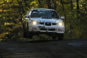 Heath Nunnemacher / Mike Rossey catch nice air at the midpoint jump on Brockway Mtn. 2, SS16, in their Subaru WRX STi.
