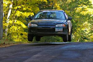 Silas Himes / Matt Himes catch air at the midpoint jump on Brockway Mtn. 2, SS16, in their Honda Civic.