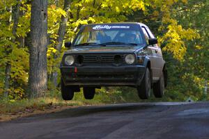 Gary Wiggin / Kim DeMotte catch nice air at the midpoint jump on Brockway Mtn. 2, SS16, in their VW GTI.