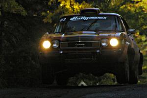 Mike Hurst / Rob Bohn keep their Ford Capri Cosworth to the ground on the midpoint jump on Brockway Mtn. 2, SS16.