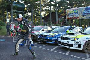 Ken Block gets doused with champagne at the ceremonial finish.