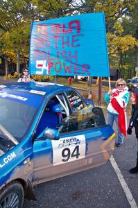 Polish fans surround the Piotr Fetela / Dariusz Belzowski Subaru Impreza after the finish. (1)