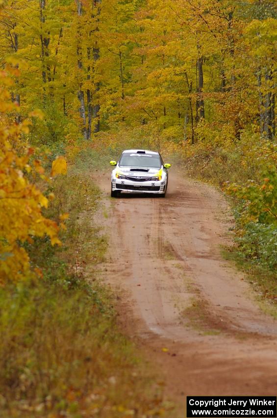 Ken Block / Alex Gelsomino come flying into the finish of Gratiot Lake, SS10, in their Subaru WRX STi.