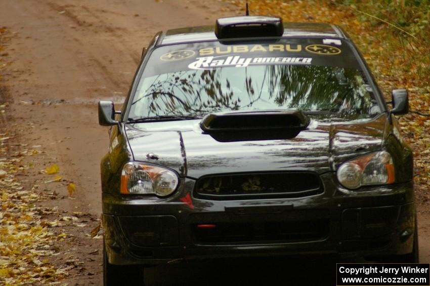 Vio Dobasu / Rob Amato in their Subaru WRX STi coast into the time control at the finish of Gratiot Lake, SS10.