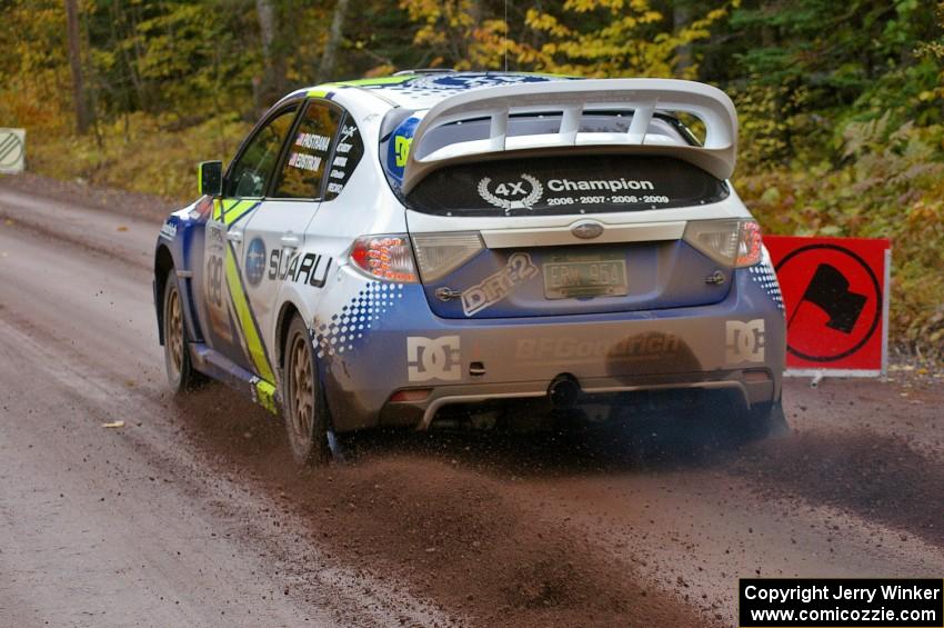 Travis Pastrana / Christian Edstrom blast away from the start of Delaware 1, SS11, in their Subaru WRX STi.