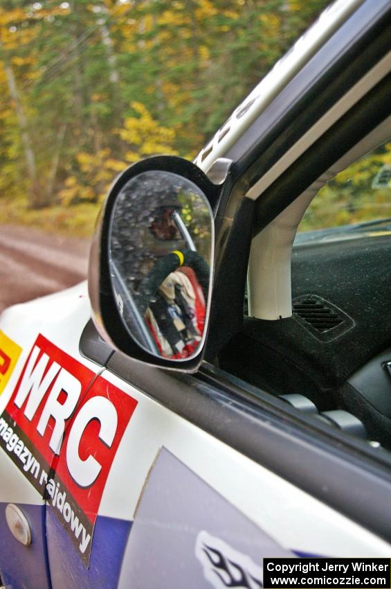 Andi Mancin sits and concentrates in the seat of his Mitsubishi Lancer Evo 9 at the start of Delaware 1, SS11.