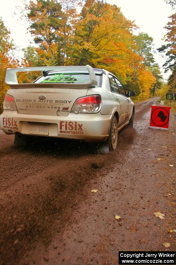 Heath Nunnemacher / Mike Rossey blast away from the start of Delaware 1, SS11, in their Subaru WRX STi.