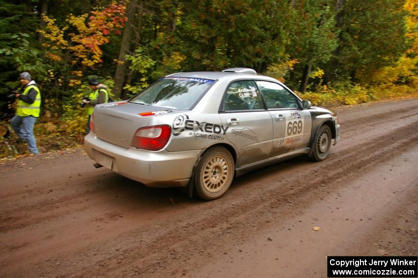 Evan Cline / Jason Grahn blast away from the start of Delaware 1, SS11, in their Subaru Impreza.