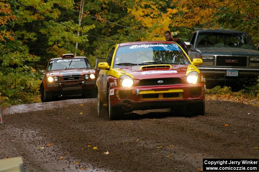 Bryan Pepp / Jerry Stang leave the start of Delaware 1, SS11, in their Subaru WRX as the Mike Hurst / Rob Bohn Ford Capri waits.