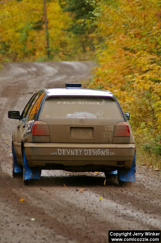 Paul Koll / Tim Knorr head uphill from the start of Delaware 1, SS11, in their VW Golf.