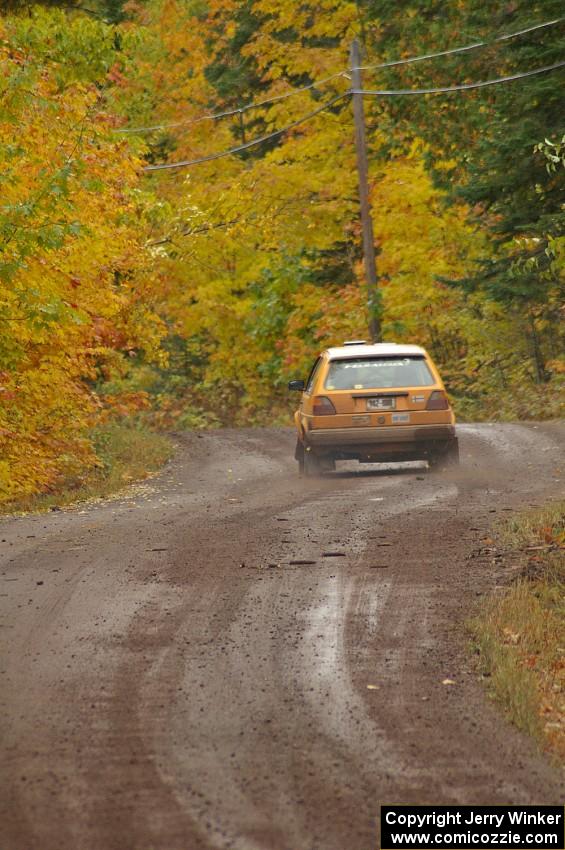 Chad Eixenberger / Chris Gordon head uphill from the start of Delaware 1, SS11, in their VW Golf.