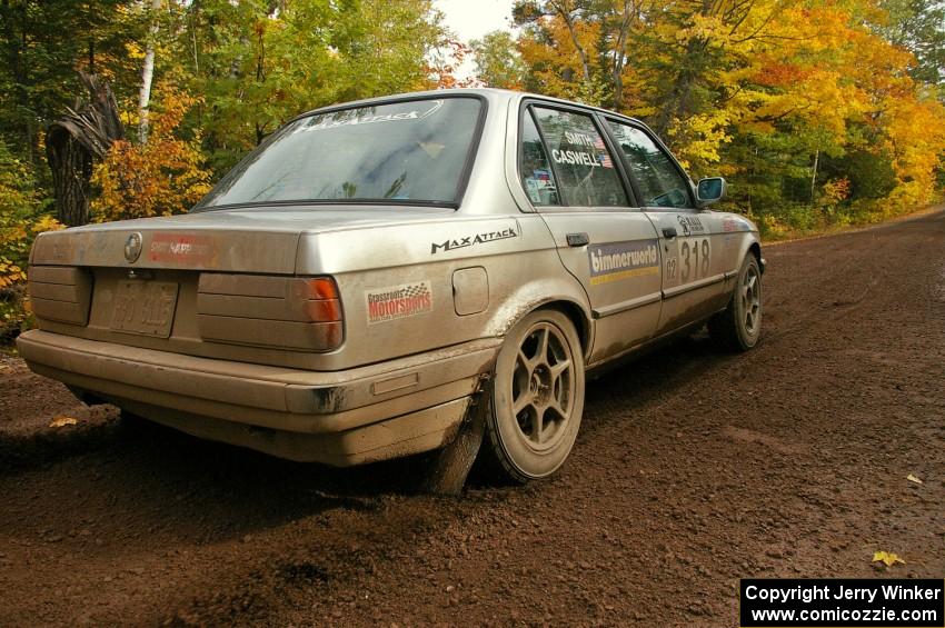 Bill Caswell / Elliott Sherwood blast away from the start of Delaware 1, SS11, in their BMW 318i.