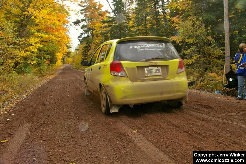 Jim Stevens / Marianne Stevens leave the start of Delaware 1, SS11, in their Suzuki Swift.