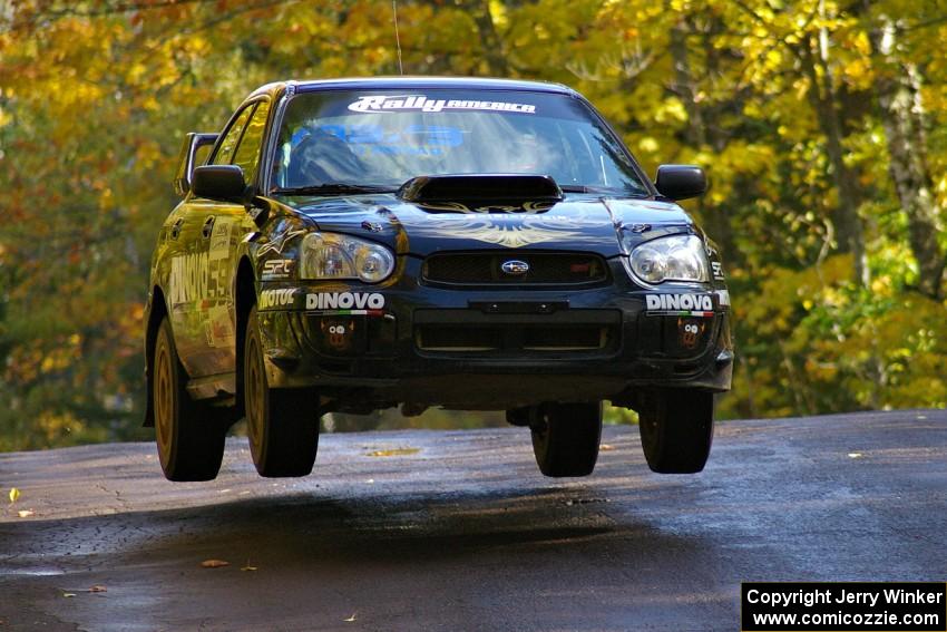 Pat Moro / Ole Holter catch nice air at the midpoint jump on Brockway Mtn. 1, SS13, in their Subaru WRX STi.