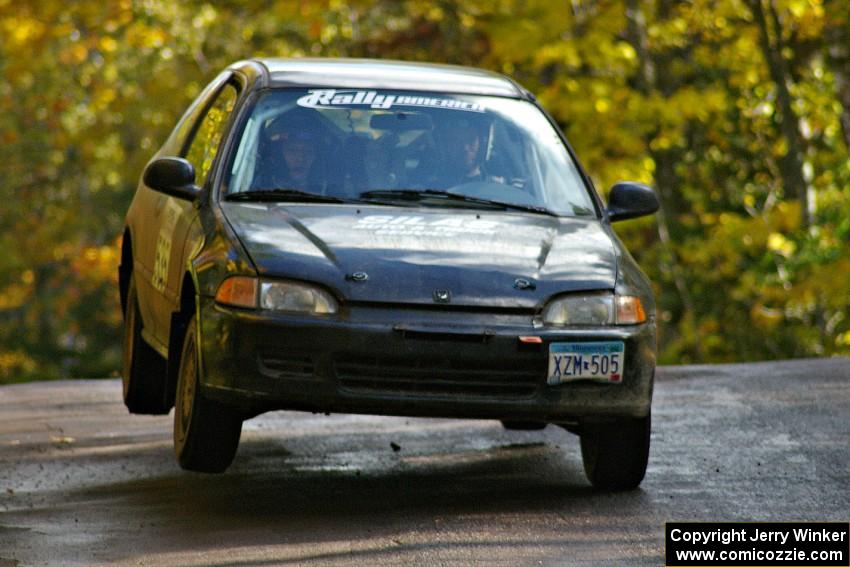 Silas Himes / Matt Himes lands soft at the midpoint jump on Brockway Mtn. 1, SS13, in their Honda Civic.