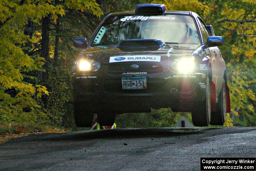Carl Siegler / David Goodman catch air in their Subaru WRX STi at the midpoint jump on Brockway Mtn. 1, SS13.