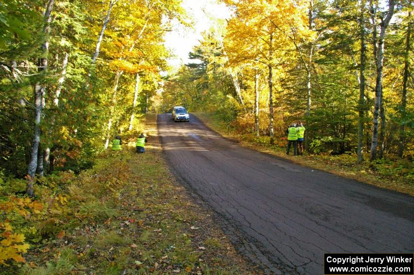 Travis Pastrana / Christian Edstrom take it easy at the midpoint jump on Brockway Mtn. 2, SS16, in their Subaru WRX STi.