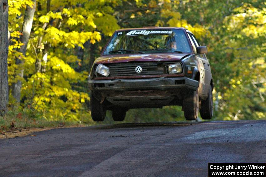 Matt Bushore / Andy Bushore catch air at the midpoint jump on Brockway Mtn. 2, SS16, in their VW Jetta.