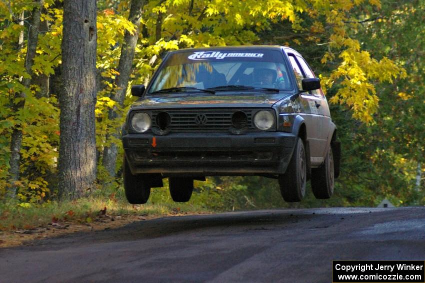 Gary Wiggin / Kim DeMotte catch nice air at the midpoint jump on Brockway Mtn. 2, SS16, in their VW GTI.