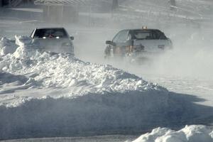 The Ty Saiki / Pete Forrey VW Passat chases the Kevin Beck / Brent Carlson Subaru Impreza.