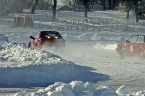 The Mark Utecht / Jay Luehmann Subaru Impreza is chased by the Brad Johnson / Len Jackson VW Fox.