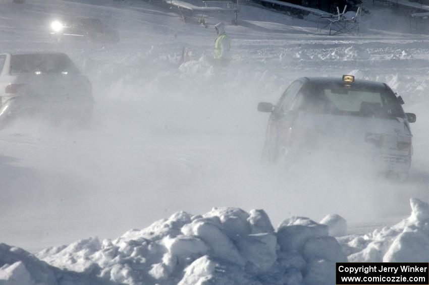 The Ty Saiki / Pete Forrey VW Passat chases the Kevin Beck / Brent Carlson Subaru Impreza.