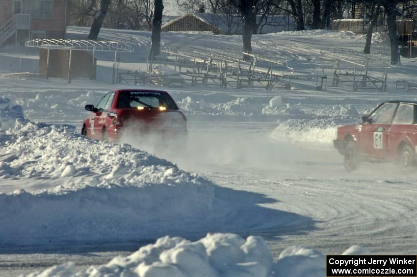 The Mark Utecht / Jay Luehmann Subaru Impreza is chased by the Brad Johnson / Len Jackson VW Fox.