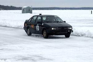 The Ty Saiki / Mike Ehleringer VW Passat comes into the pits early.