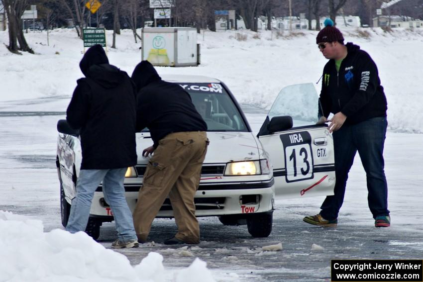 The Carl Siegler / David Goodman / Dan Drury Subaru Legacy comes in for an early pit stop.