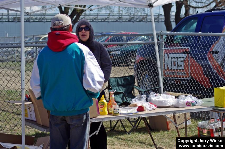 Hot dogs and brats for sale with money going to charity.