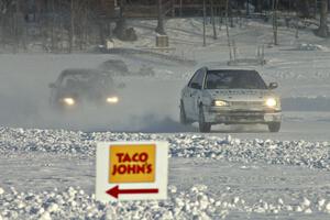 The Kevin Beck / Brent Carlson Subaru Impreza chased by the Ty Saiki / Pete Forrey VW Passat.