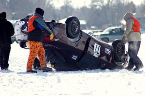 The Bonnie Stoehr / Jake Weber / Pete Weber Mitsubishi Eclipse had a light roll at end of lap one.