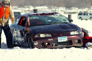 Bonnie Stoehr / Jake Weber / Pete Weber Mitsubishi Eclipse after being flipped over.