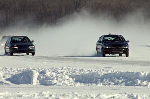 The Ryan Hammond / Kyle Laursen Honda Civic and Ty Saiki / Pete Forrey VW Passat on the front straight.