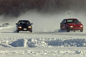 The Chad Reinhofer / Jason Lindell Dodge Shadow and Tim Stone / Dan Gervais Subaru Impreza on the front straight.