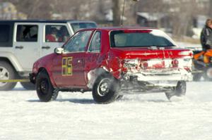 The Chad Reinhofer / Jason Lindell Dodge Shadow is towed off the track.