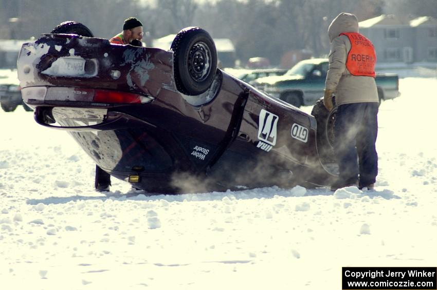 The Bonnie Stoehr / Jake Weber / Pete Weber Mitsubishi Eclipse had a light roll at end of lap one.