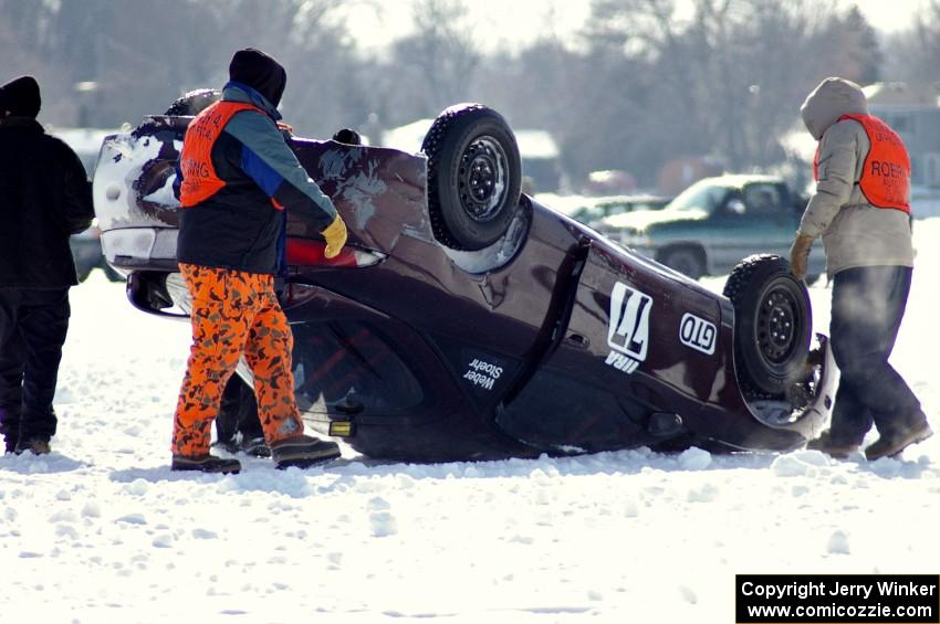 The Bonnie Stoehr / Jake Weber / Pete Weber Mitsubishi Eclipse had a light roll at end of lap one.