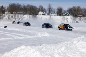 The field streams through on the first lap.