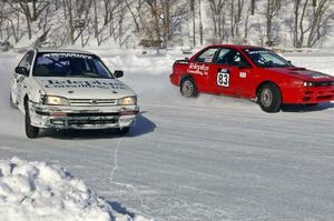 Brent Carlson / Kevin Beck Subaru Impreza passes the Jay Luehmann / Mark Utecht Subaru Impreza