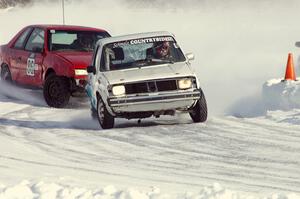 Dick Nordby / Josh Vogesver VW Rabbit and the Chad Reinhofer / Jason Lindell / Cody Reinhofer Plymouth Sundance