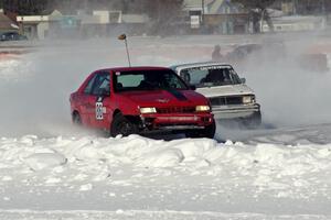 Chad Reinhofer / Jason Lindell / Cody Reinhofer Plymouth Sundance and Dick Nordby / Josh Vogesver VW Rabbit