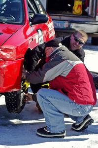 Tom Fuehrer and Will Cammack work on the Mark Utecht / Tom Fuehrer Subaru Impreza before the enduro.